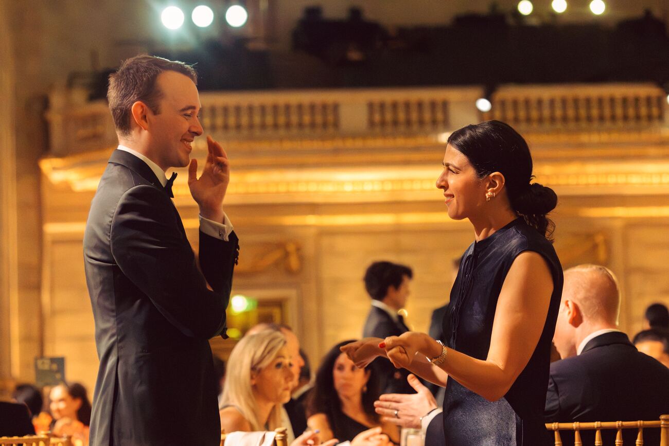 Guests in conversation in the main hall